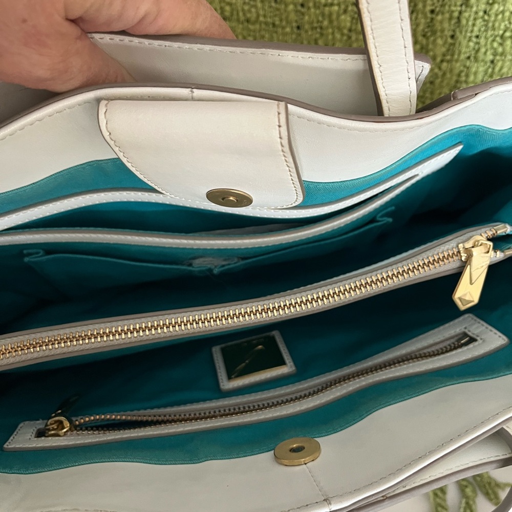 Beautiful Vince Camuto bag with tassels use maybe two or three times